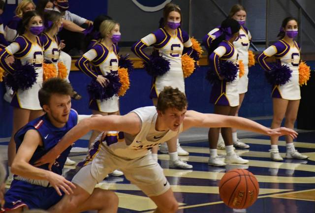 Campbell Countys Aydan Hamilton and Montgomery Countys Brandon Dyer battle for a loose ball. (Evan Dennison, The Ledger Independent)