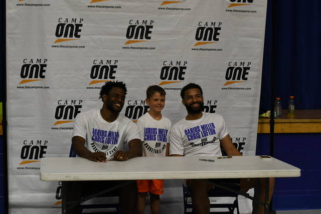 127202347_web1_millerlofton
Following the conclusion of the Darius Miller-Chris Lofton basketball camp, campers were provided opportunities to have their picture taken with the local stars. Shown with Miller and Lofton is Archer Jones.