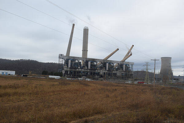 129061084_web1_stacks1
The smokestack demolition at the former James Stuart Electric Generating Station, near Manchester, Ohio, took place Sunday morning just a few minutes after 10 a.m. The demolition marked the end of an era for the area and the plant that once employed hundreds.