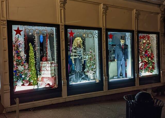 The window displays on the corner of Market Street and Third Street.