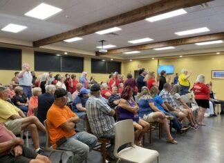 
			
				                                Attendees are sworn in to speak at the meeting on Sept. 3.
 
			
		