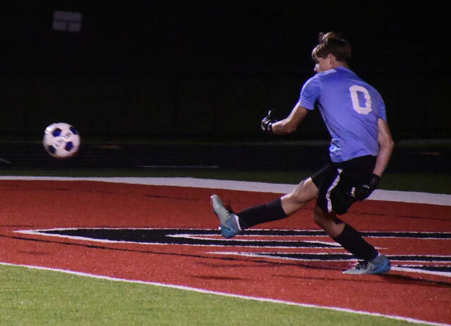 <p>Landon Frederick sends the ball down the field against the Pendleton County Wildcats in the 38th District championship on Oct. 9, 2025.</p>